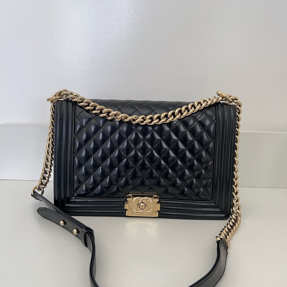 AUTHENTIC Chanel Black and Gold Crossbody Bag with Quilted Design